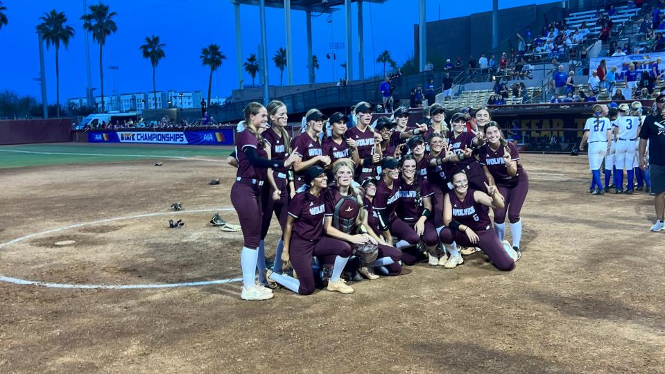 Desert Mountain softball players celebrate after winning the AIA 5A state championship at Farrington Stadium in Tempe on May, 13, 2024.