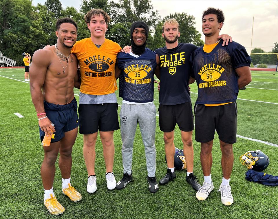 Some of Moeller's top players this season, from left, senior running back Jordan Marshall, senior tight end Eli Duffy, senior cornerback Karson Hobbs, senior quarterback Drew Robinson, senior defensive lineman Jewett Hayes. Moeller football practice, July 18, 2023.