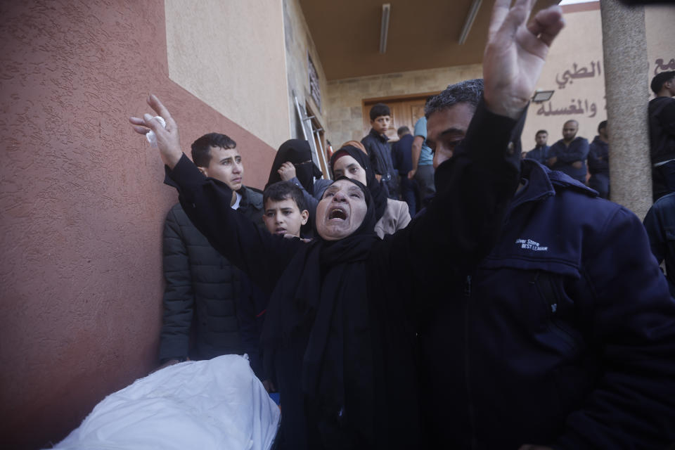 Palestinians attend a funeral for their relatives killed in the Israeli bombardment of the Gaza Strip in Khan Younis, Wednesday, Dec. 6, 2023. (AP Photo/Mohammed Dahman)