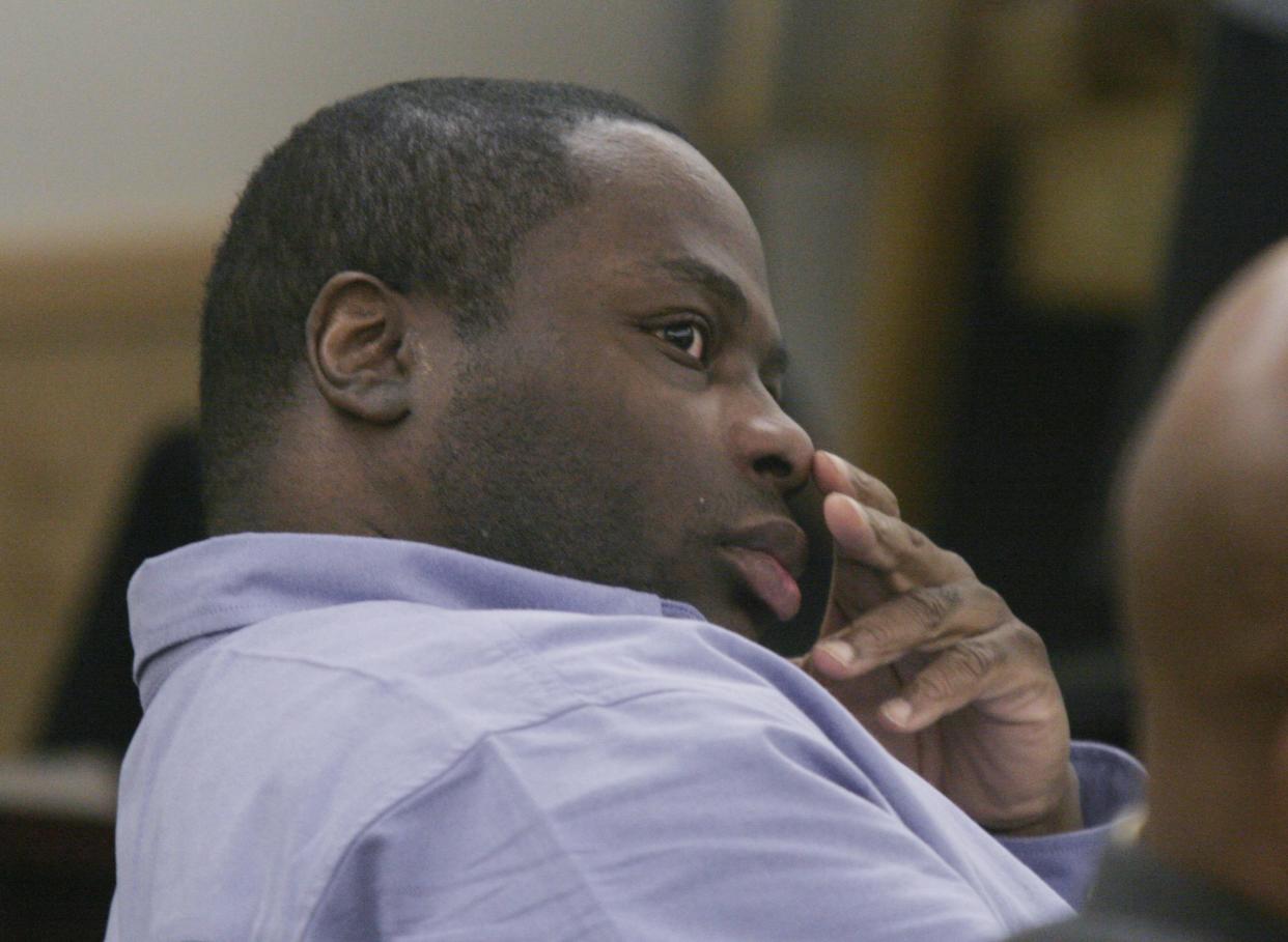 Edward Lee Busby Jr. watches during the punishment phase of his capital murder trial, Tuesday, Nov. 15, 2005, in Fort Worth, Texas.