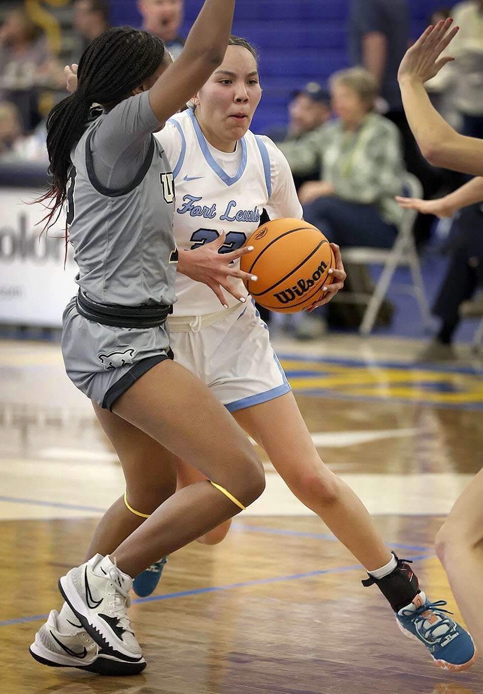 Lanae Billy of Fort Lewis College drives through a double team to the basket while playing the University of Colorado Colorado Springs on Friday, Jan. 6, 2023 inside the Whalen Gymnasium at Fort Lewis College.