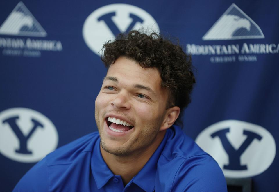 BYU quarterback Jaren Hall laughs during an interview during BYU football media day in Provo on Wednesday, June 22, 2022.