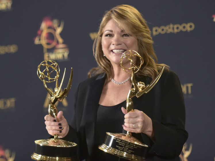Valerie Bertinelli holds two Daytime Emmy trophies