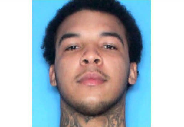 This undated photo provided by the New Orleans Police Department shows Stafford Starks. Police Chief Shaun Ferguson identified one suspect as Starks, 21. He was in custody after his arrest in St. Mary. Charges he faces include eight counts of attempted second-degree murder. (New Orleans Police Department via AP)