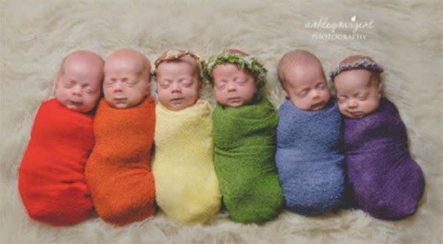 The Waldrop babies in colour-coded wraps denoting their order of birth. (Photo: Facebook/Ashley Sargent Photography)