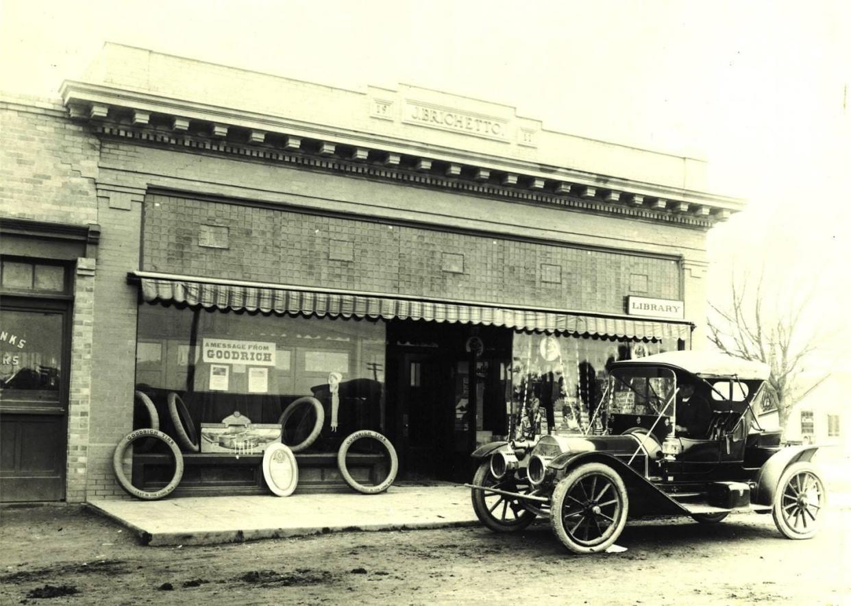 Historic J. Brichetto Building in Banta, with Goodrich Tires still produced in virgin white rubber, awaiting a 1914 Packard automobile.