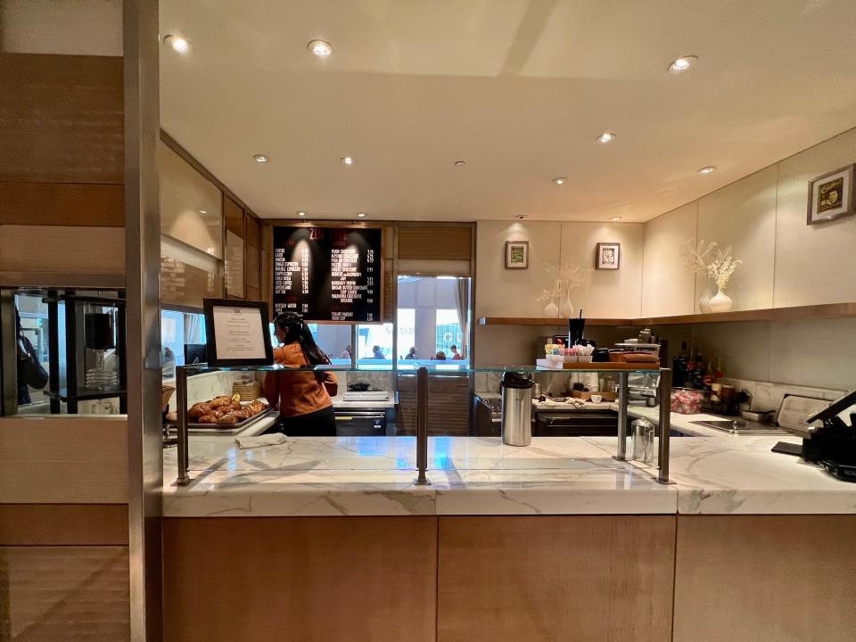 A coffee bar counter for drinks and pastries.