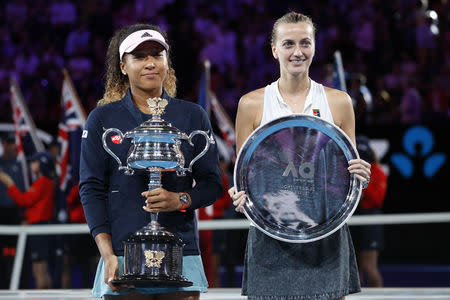 Tennis - Australian Open - Women's Singles Final - Melbourne Park, Melbourne, Australia, January 26, 2019. Japan's Naomi Osaka and Czech Republic's Petra Kvitova pose with their trophies. REUTERS/Kim Kyung-Hoon