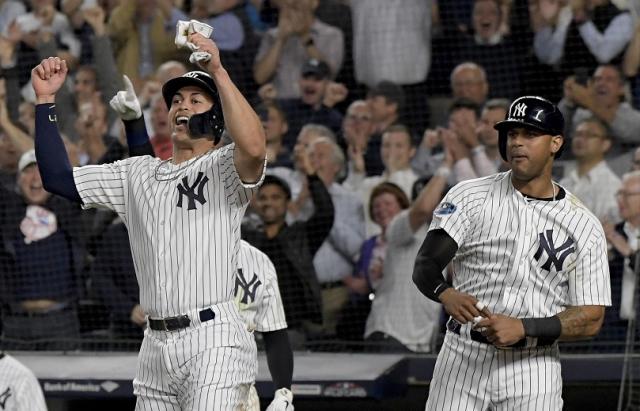 Giancarlo Stanton makes postseason home run history, but the