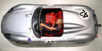 STUTTGART, GERMANY - APRIL 22: Tennis player Maria Sharapova poses in a Porsche 718 RS 60 Spyder at the Porsche Museum on April 22, 2013 in Stuttgart, Germany. (Photo by Alexander Hassenstein/Bongarts/Getty Images)