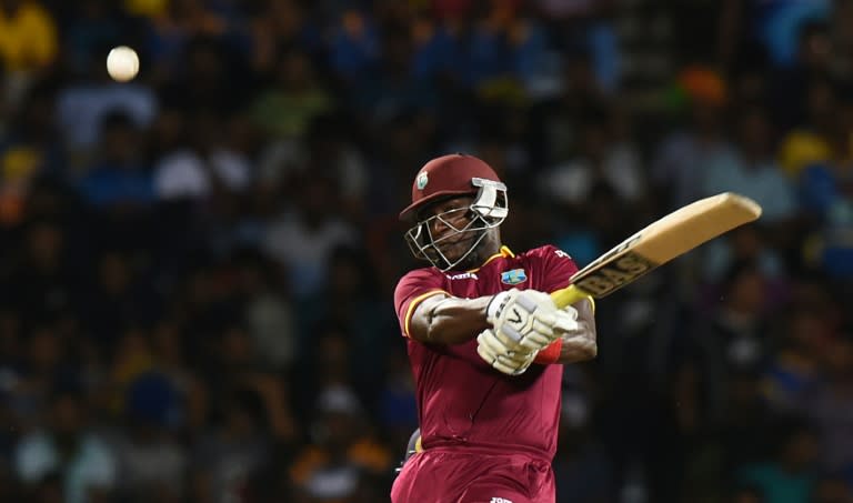 West Indies' Darren Sammy plays a shot during the first T20 International against Sri Lanka in Pallekele on November 9, 2015