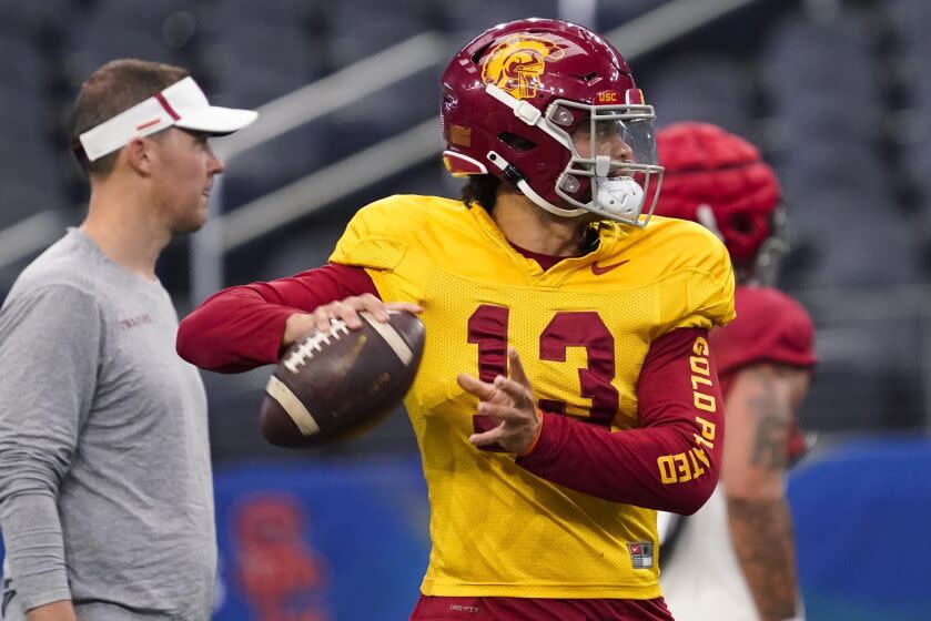 Southern California quarterback Caleb Williams (13) practices ahead of the Cotton Bowl NCAA college football game.