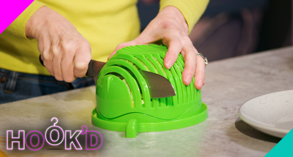 The 60 Second Salad Maker is a strainer, cutting tool, and server all in one. 