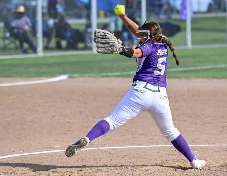 El Diamante's Jorja Moreno pitches against Redwood in an East Yosemite League high school softball Thursday, April 25, 2024.