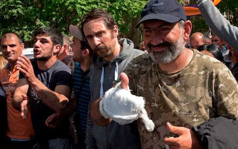 Opposition leader Nikol Pashinyan meets with supporters after being released on Monday - Credit: Karen Minasyan/AFP/Getty Images