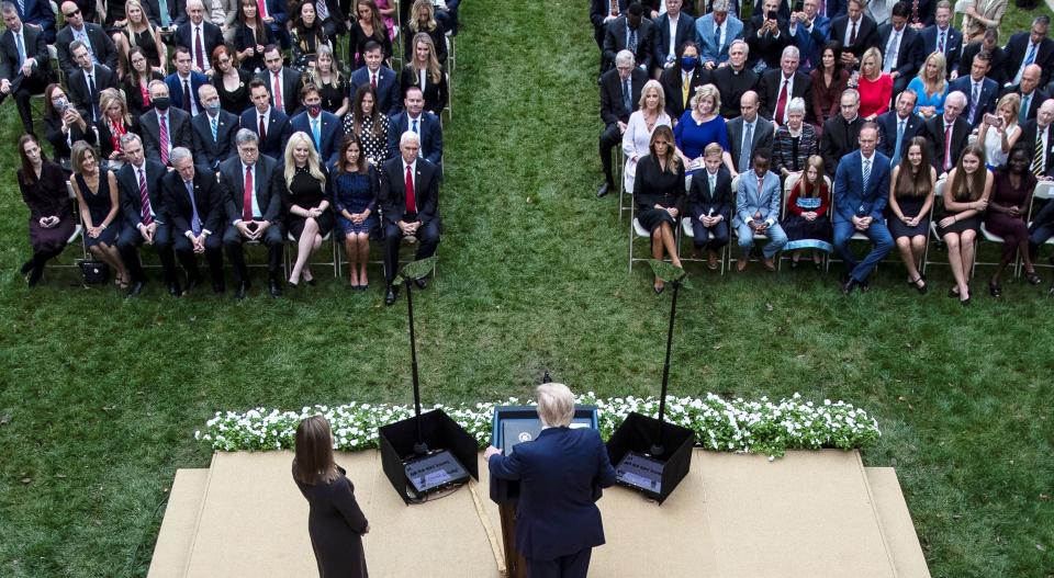 President Donald Trump announces Amy Coney Barrett as his nominee to fill the Supreme Court seat left vacant by the death of Justice Ruth Bader Ginsburg. Democrats are condemning GOP efforts to confirm Barrett before the 2020 presidential election results are known. (Photo: Carlos Barria/Reuters)