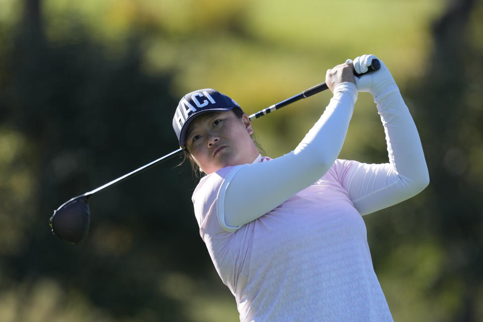 Angel Yin of the United States watches her tee shot on the second hole during the final round of the BMW Ladies Championship at the Seowon Hills Country Club in Paju, South Korea, Sunday, Oct. 22, 2023. (AP Photo/Lee Jin-man)