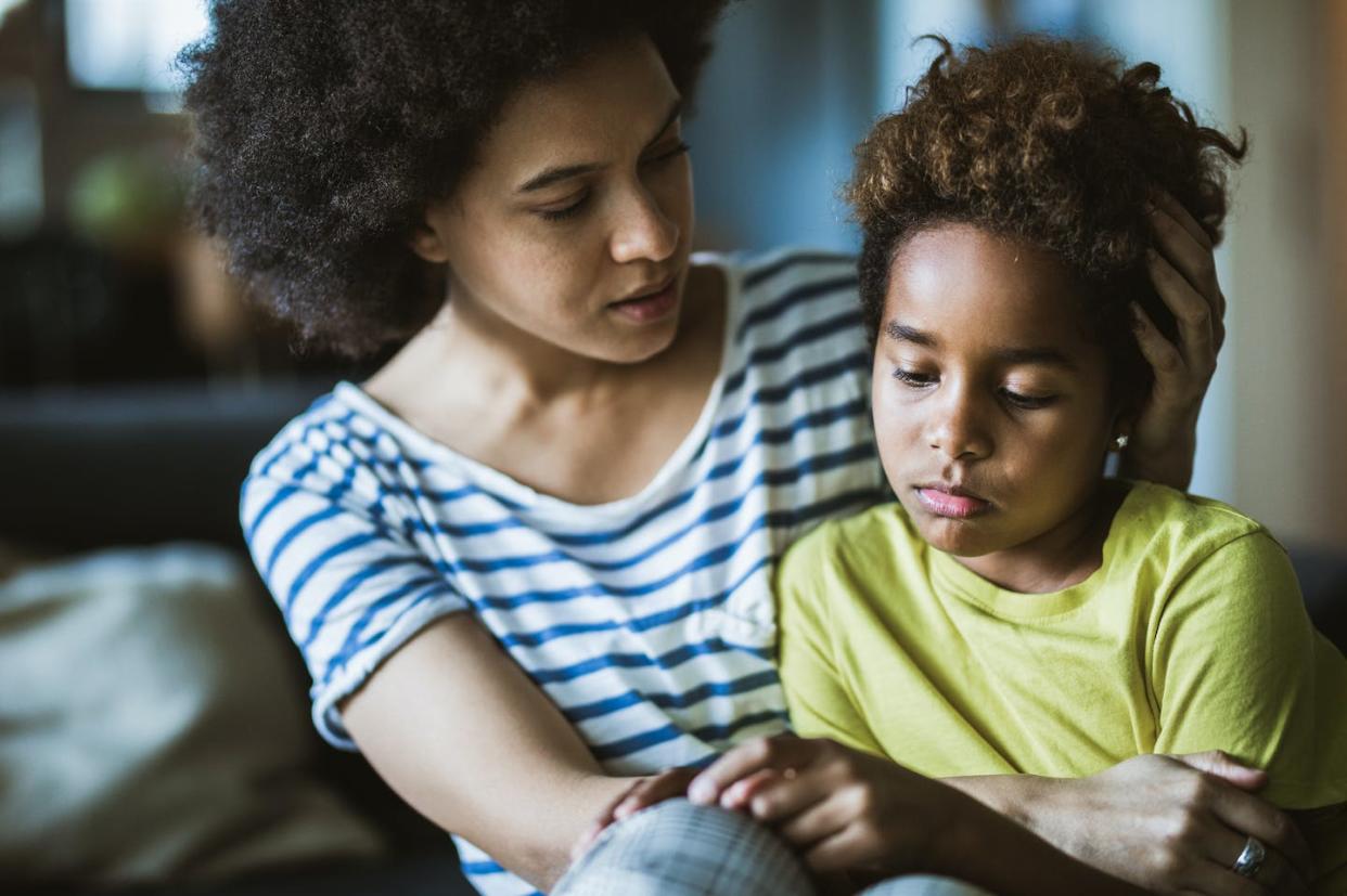 The stress of experiencing high levels of community violence harms entire families. <a href="https://www.gettyimages.com/detail/photo/african-american-mother-consoling-her-sad-girl-at-royalty-free-image/1077179266" rel="nofollow noopener" target="_blank" data-ylk="slk:skynesher/E+ via Getty Images;elm:context_link;itc:0;sec:content-canvas" class="link ">skynesher/E+ via Getty Images</a>