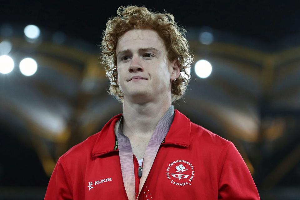 Men's pole vault silver medalist Canada's Shawnacy Barber on the podium at Carrara Stadium during the 2018 Commonwealth Games on the Gold Coast, Australia, on April 12, 2018.