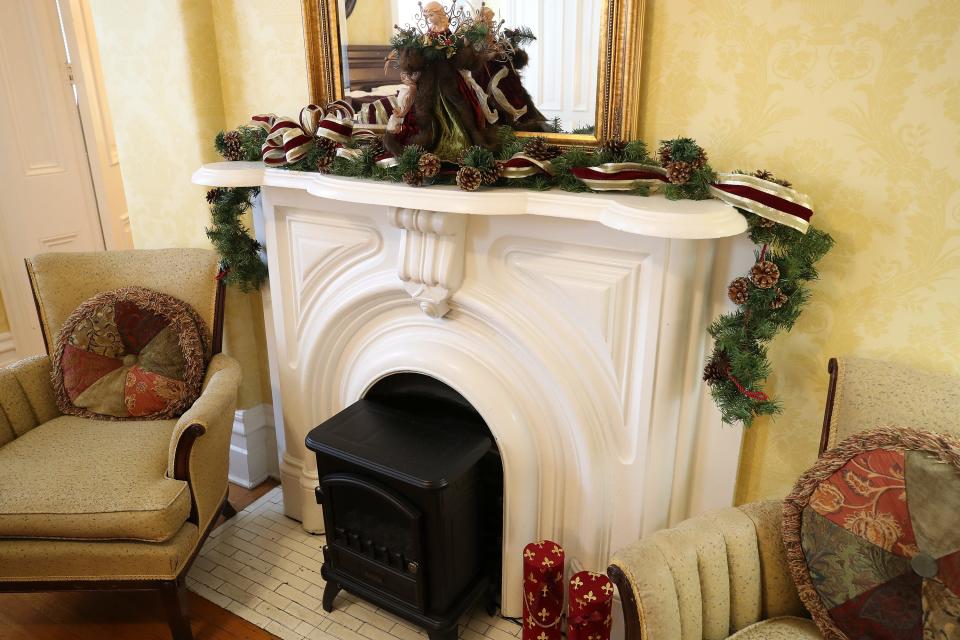 Fireplace in the Edison Room on the second floor in the DuPont Mansion Bed & Breakfast.