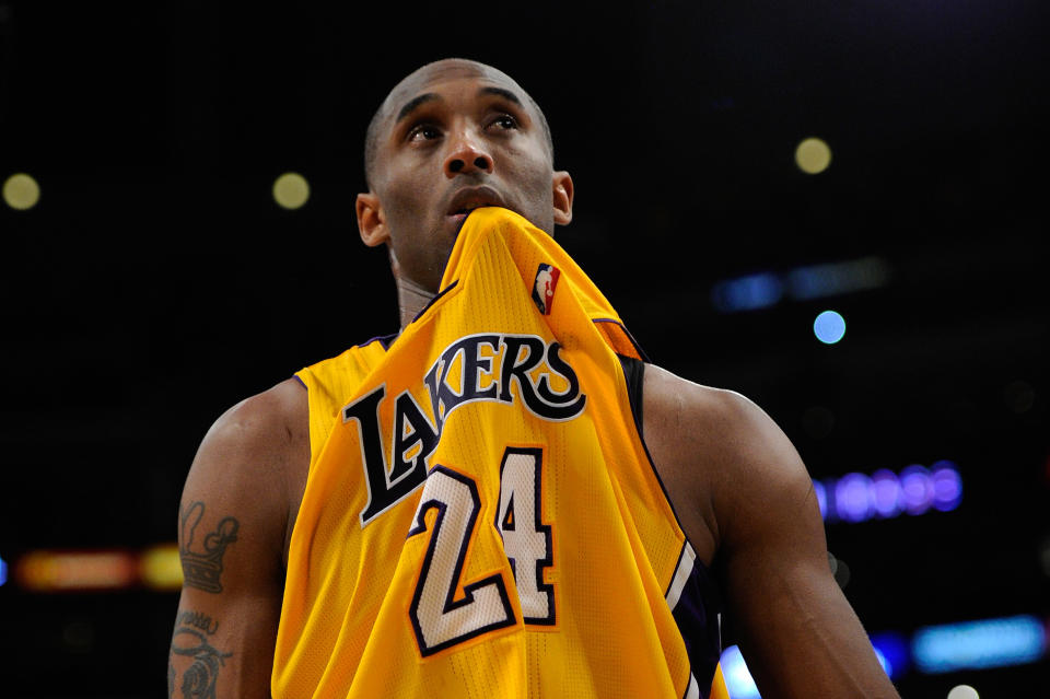 Lakers guard Kobe Bryant bites his jersey during a game against the Dallas Mavericks on May 2, 2011, in Los Angeles. (Photo by Kevork Djansezian/Getty Images)