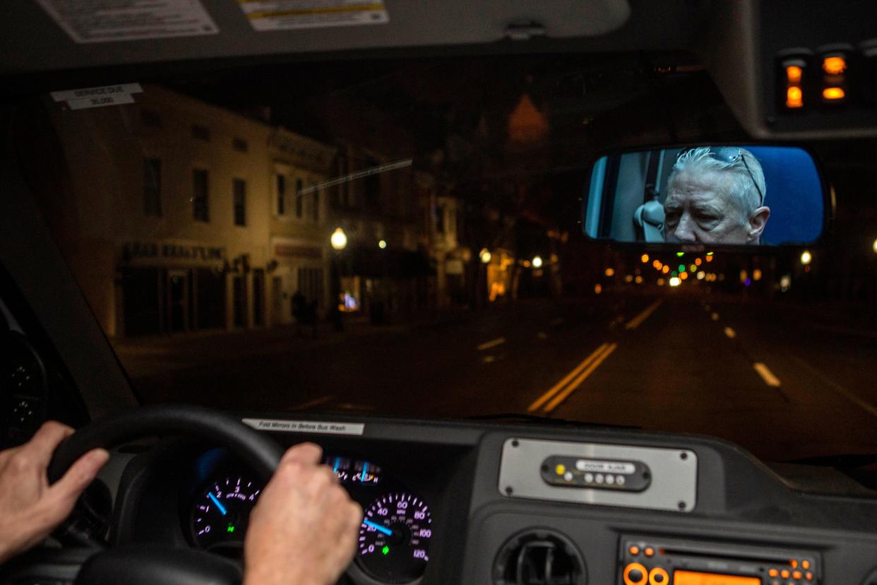 Mark Fawley, driver for the Chillicothe Transit System, drives through downtown Chillicothe during his passenger route early in the morning on Dec. 20. 2022 in Chillicothe, Ohio. The Chillicothe Transit System provides free transportation for local passengers in need of transportation around the Chillicothe area.