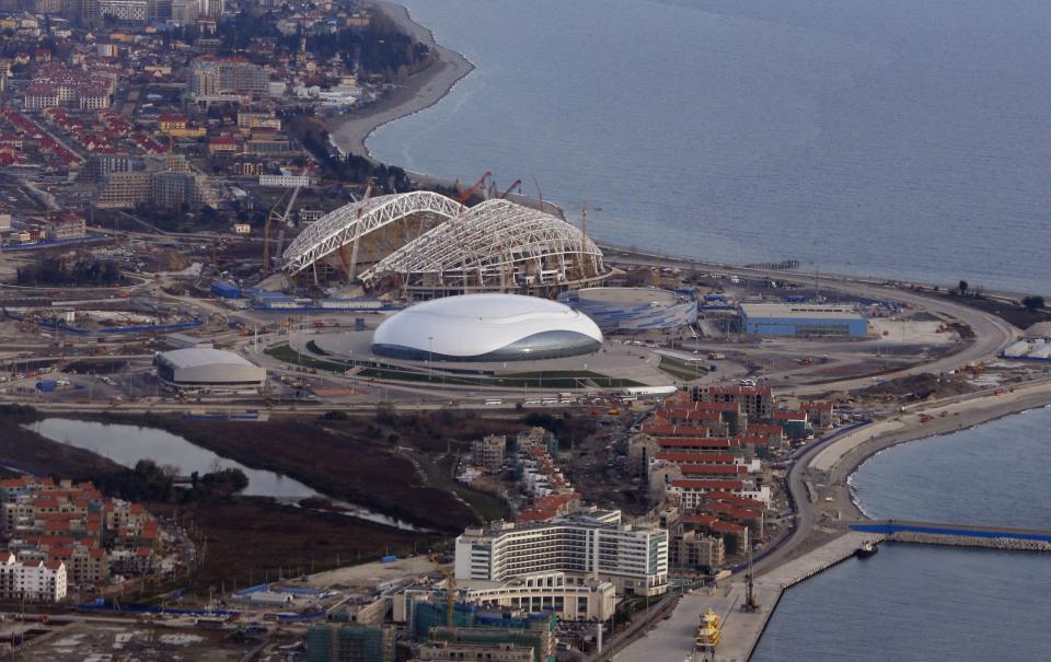 FILE - This Feb. 4, 2013 file photo shows an aerial view of the Olympic Park under construction for the Winter Olympics in Sochi, Russia. The 2014 Winter Olympics will kick off on Feb. 7, 2014. (AP Photo/Dmitry Lovetsky, File)