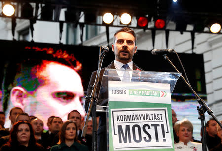 Chairman of the Hungarian right wing opposition party Jobbik Gabor Vona speaks at a rally during Hungary's National Day celebrations, which also commemorates the 1848 Hungarian Revolution against the Habsburg monarchy, in Budapest, Hungary March 15, 2018. Picture taken March 15, 2018. REUTERS/Bernadett Szabo