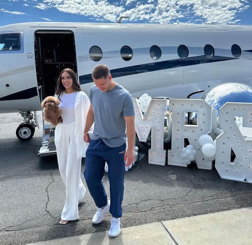 <p>Olivia Culpo/ Instagram</p> Olivia Culpo and Christian McCaffrey boarding a private jet