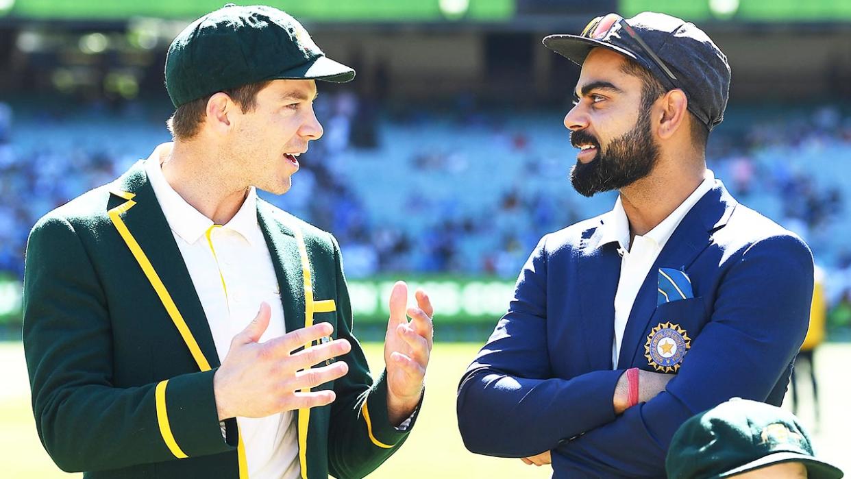 Indian captain Virat Kohli (pictured right) before the toss with Tim Paine (pictured left).