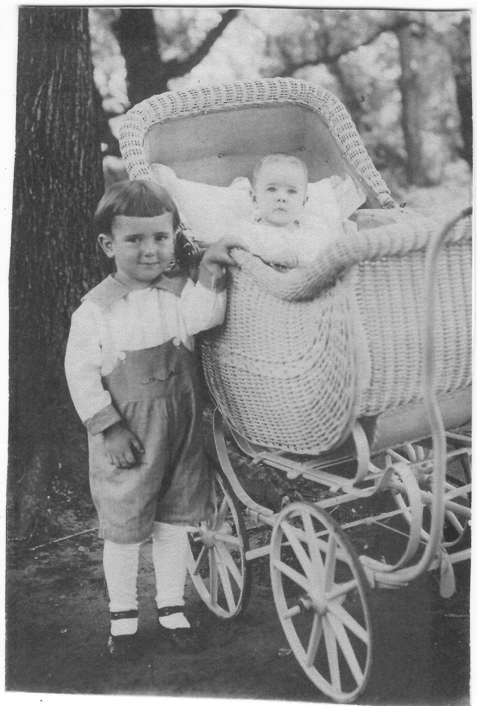 William Leander "Bill" Reed (left) poses with baby brother Wayne "Hap" Norris Reed. Both were sons of William and Helen (Norris) Reed. Hap was born in 1922 and Bill was born in 1917.