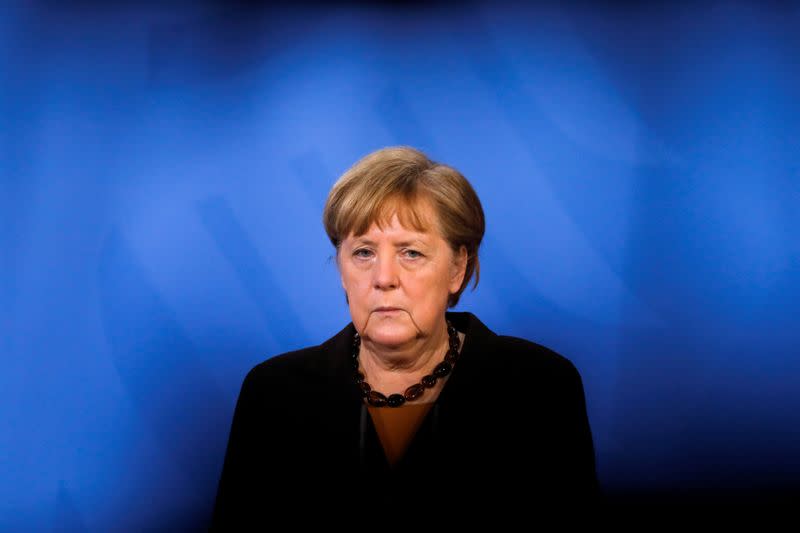 FILE PHOTO: FILE PHOTO: German Chancellor Angela Merkel briefs the media after a virtual meeting with federal state governors at the chancellery in Berlin