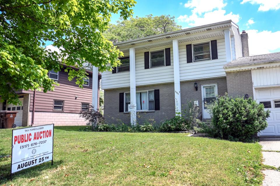 A property on Pamela Place is up for tax foreclosure auction photographed on Tuesday, July 26, 2022, in Lansing.