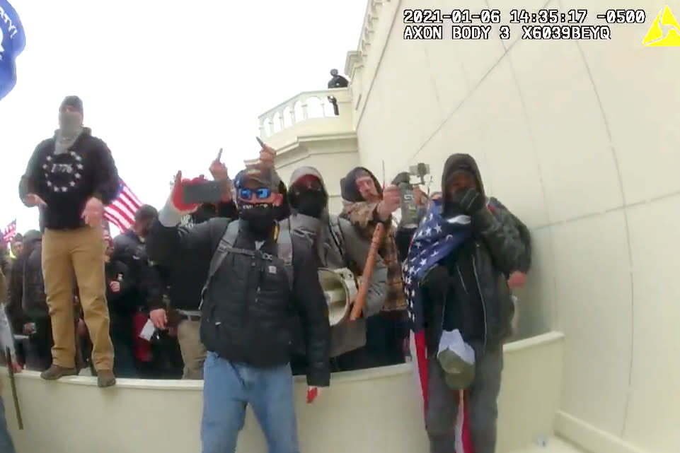 A protester uses pepper spray at the U.S. Capitol, on Jan 6, 2021. (U.S. District Court for the District of Columbia)