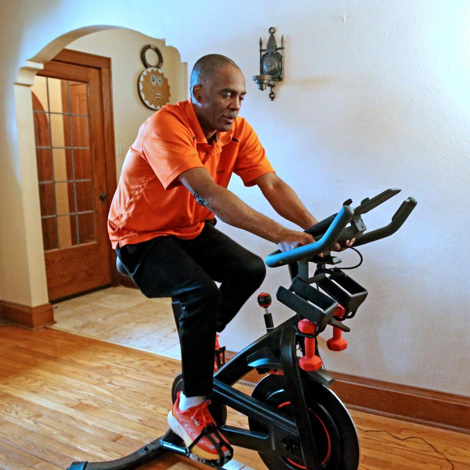 Reggie Jackson rides his bike on Thursday, March 2, 2023, that is part of his exercise regiment at his home.  The local historian, who is now with Nurturing Diversity Partners, suffered a minor stroke in November 2022.  Jackson was rushed to St. Mary’s Hospital.  A CT scan showed an artery on the right side of his brain was 90% clogged.  Statistics show African Americans are 50 percent more likely to have a stroke when compared to their white adult counterparts. Black men are also 70 percent more likely to die from a stroke as compared to whites.