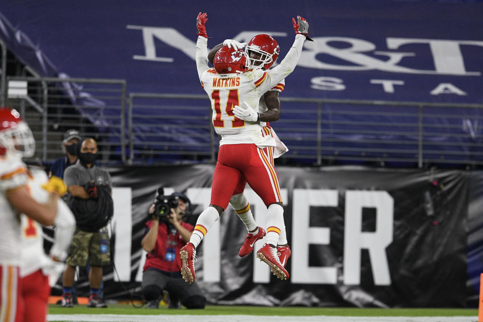 Kansas City Chiefs wide receivers Sammy Watkins (14) and Mecole Hardman (17) celebrate Hardman's touchdown during the first half of an NFL football game against the Baltimore Ravens, Monday, Sept. 28, 2020, in Baltimore. (AP Photo/Nick Wass)