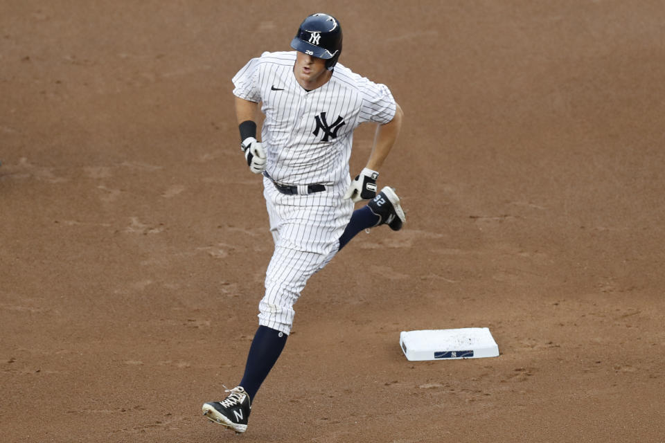 New York Yankees DJ LeMahieu runs on a solo home run during the first inning of a baseball game against the Philadelphia Phillies, Monday, Aug. 3, 2020, at Yankee Stadium in New York. (AP Photo/Kathy Willens)