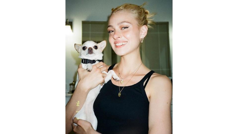 Nicola Peltz with her dog Nala