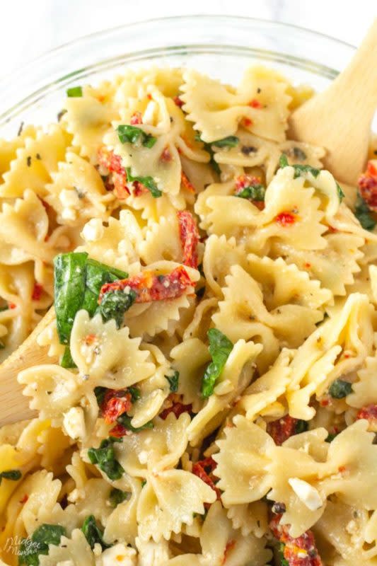 <p>Midget Momma</p><p>Sundried tomato pasta salad is seriously the easiest pasta salad recipe that you could ever make. If you are looking for an amazing, flavorful Italian pasta salad recipe this is it!</p><p><strong>Get the recipe:<em> <a href="https://www.midgetmomma.com/sundried-tomato-pasta-salad/" rel="nofollow noopener" target="_blank" data-ylk="slk:Sundried Tomato Pasta Salad;elm:context_link;itc:0;sec:content-canvas" class="link ">Sundried Tomato Pasta Salad</a></em></strong></p>