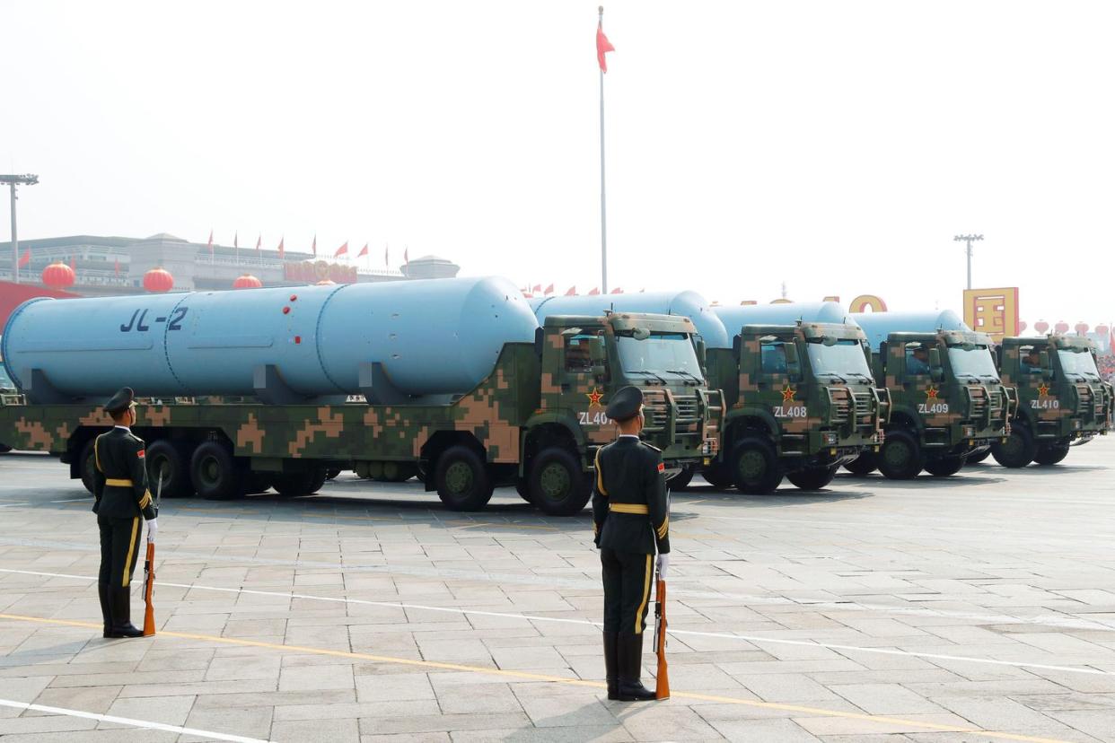 2cmgx37 military vehicles carrying jl 2 submarine launched ballistic missiles drive past tiananmen square during the military parade marking the 70th founding anniversary of people's republic of china, on its national day in beijing, china october 1, 2019 reutersthomas peter