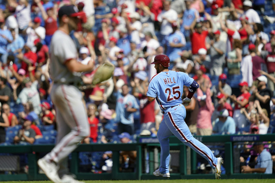 Philadelphia Phillies' Darick Hall runs the basses after hitting a home run off of Washington Nationals relief pitcher Cory Abbott during the fourth inning of a baseball game, Sunday, Aug. 7, 2022, in Philadelphia. (AP Photo/Matt Rourke)