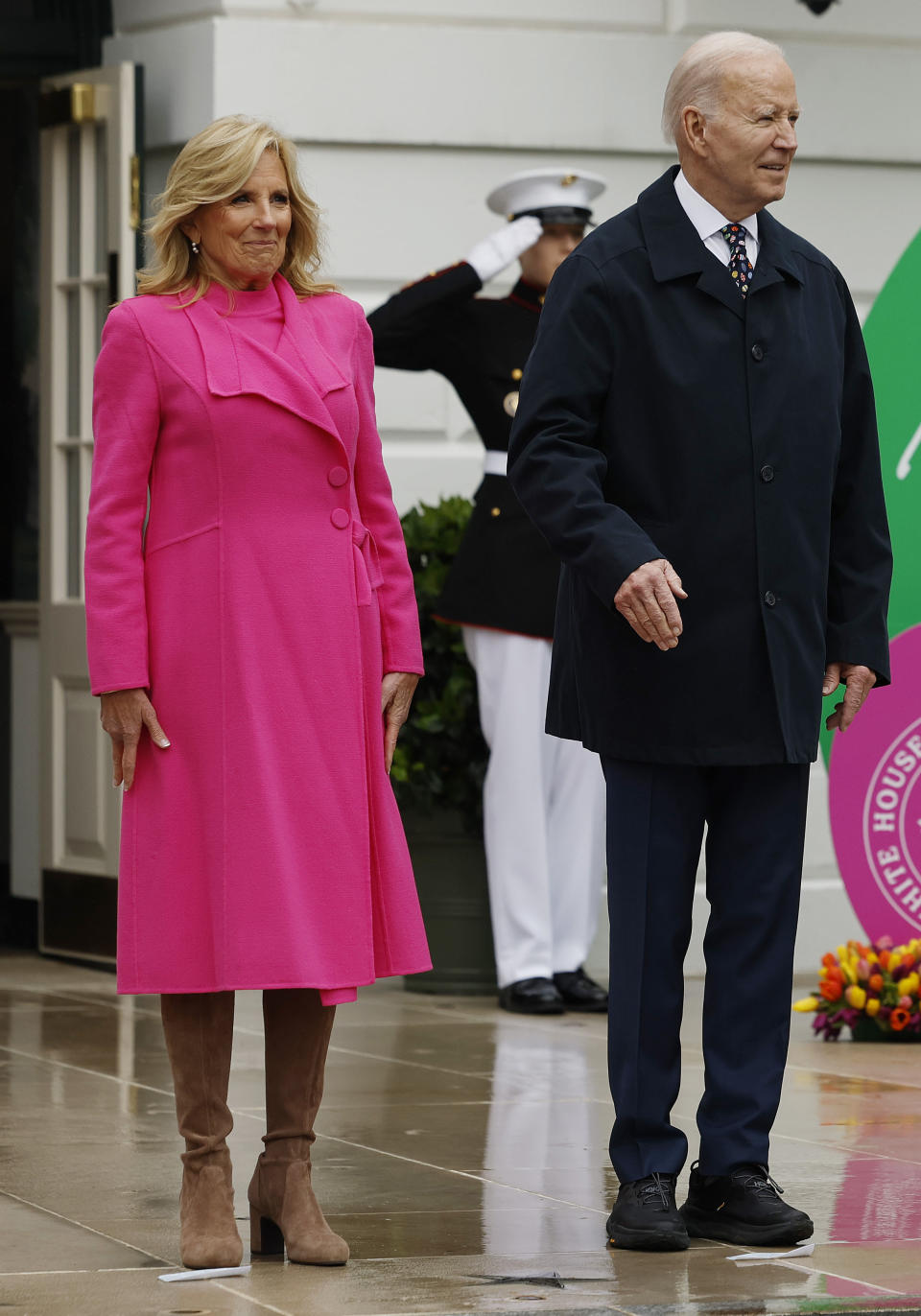 WASHINGTON, DC - APRIL 01: (L-R) pink coat dress First lady Jill Biden, U.S. President Joe Biden, Vice President Kamala Harris and second gentleman Doug Emhoff wave to guests during the White House Easter Egg Roll on the South Lawn on April 01, 2024 in Washington, DC. The White House said they are expecting thousands of children and adults to participate in the annual tradition of rolling colored eggs down the White House lawn, a tradition started by President Rutherford B. Hayes in 1878.  (Photo by Chip Somodevilla/Getty Images)