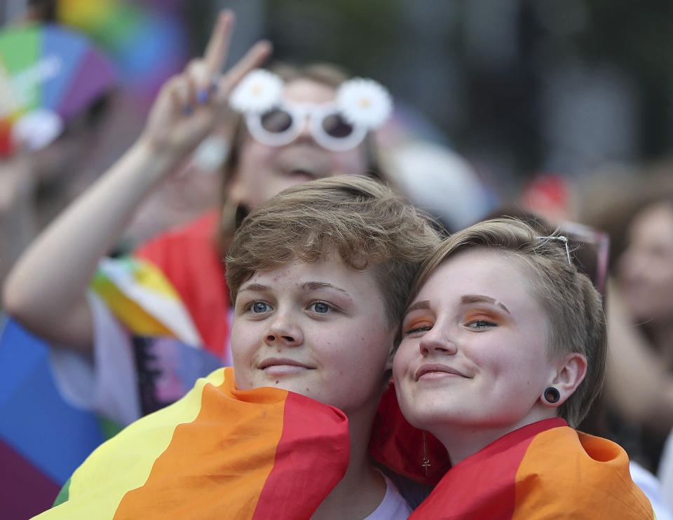 People take part in a gay pride parade in Warsaw, Poland, on Saturday, June 8, 2019. The Equality Parade is the largest gay pride parade in central and Eastern Europe. It brought thousands of people to the streets of Warsaw at a time when the LGBT rights movement in Poland is targeted by hate speecheds and a government campaign depicting it as a threat to families and society. (AP Photo/Czarek Sokolowski)