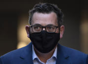 Victorian Premier Daniel Andrews arrives at a press conference during lockdown due to the continuing spread in Melbourne, Thursday, Aug. 6, 2020. Victoria state, Australia's coronavirus hot spot, announced on Monday that businesses will be closed and scaled down in a bid to curb the spread of the virus. (AP Photo/Andy Brownbill)