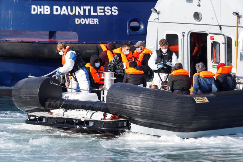 A Border Force boat carrying migrants arrives at Dover harbour, in Dover