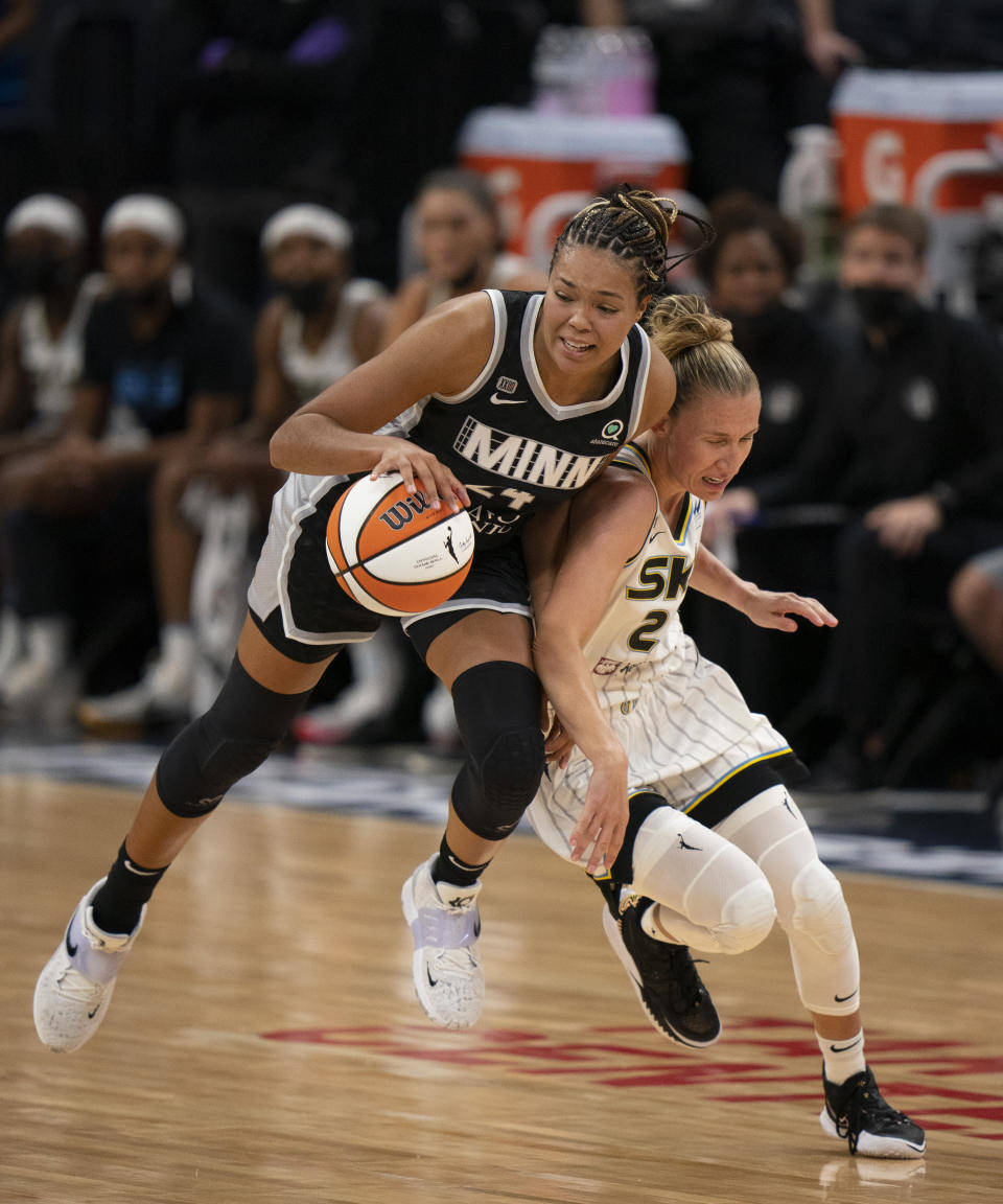 Minnesota Lynx forward Napheesa Collier (24) gets control of the ball after forcing Chicago Sky guard Courtney Vandersloot (22) to turn it over in the second quarter of a WNBA basketball game, Sunday, Sept. 26, 2021, in Minneapolis. (Jeff Wheeler/Star Tribune via AP)