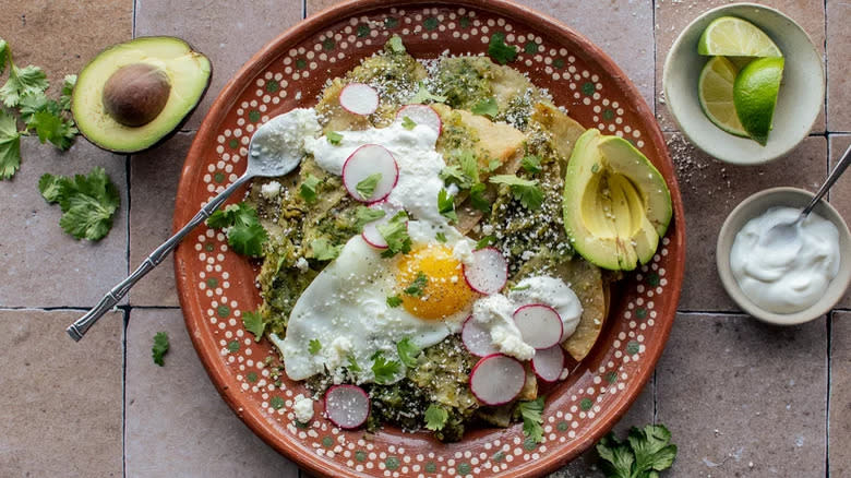 chilaquiles on brown plate