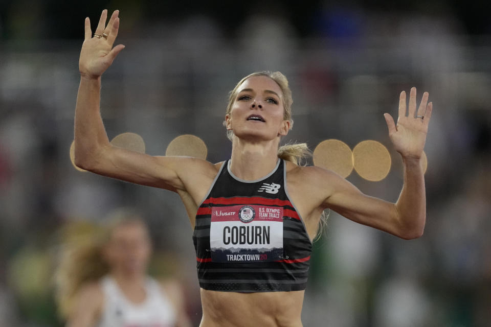 Emma Coburn celebrates after winning the women's 3000-meter steeplechase at the U.S. Olympic Track and Field Trials Thursday, June 24, 2021, in Eugene, Ore. (AP Photo/Ashley Landis)