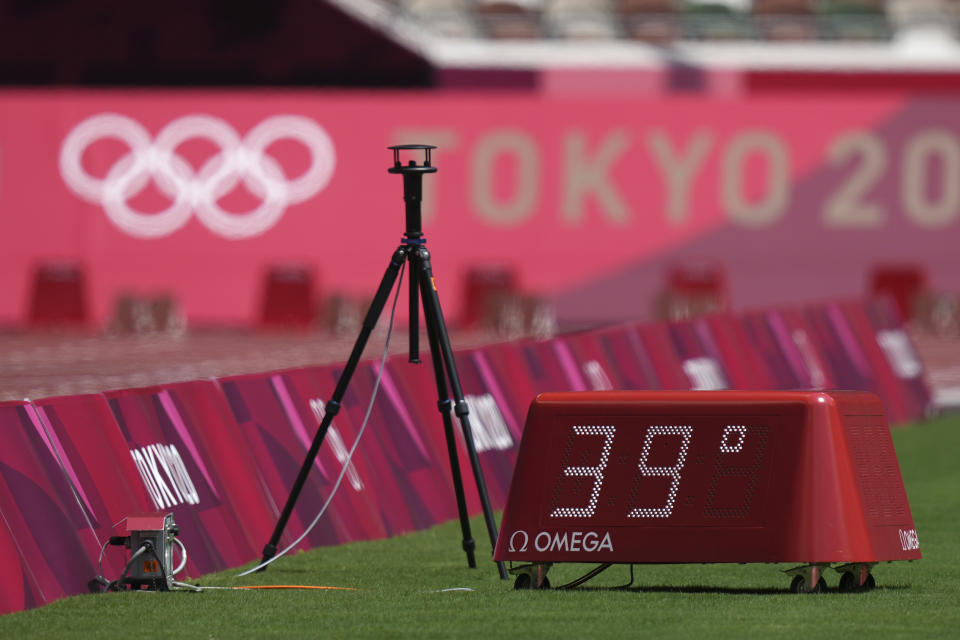 Temperature on the field during the athletics at the 2020 Summer Olympics, Sunday, Aug. 1, 2021, in Tokyo. (AP Photo/Matthias Schrader)