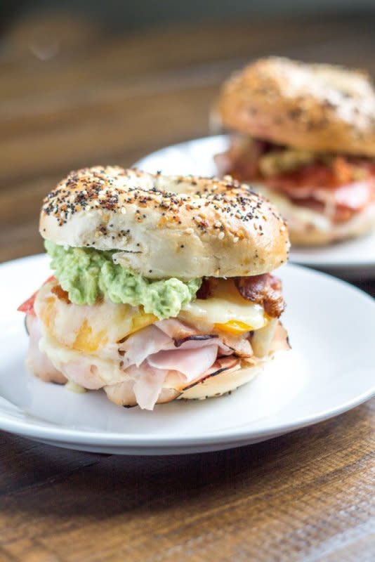 <p>TheKittchen.com</p><p>Made with turkey, cheddar, tomato, bacon, mustard and avocado mayo on an everything bagel.</p><p><strong>Get the recipe: <a href="https://thekittchen.com/the-best-turkey-sandwich/" rel="nofollow noopener" target="_blank" data-ylk="slk:The Best Turkey Sandwich;elm:context_link;itc:0;sec:content-canvas" class="link ">The Best Turkey Sandwich</a></strong></p>